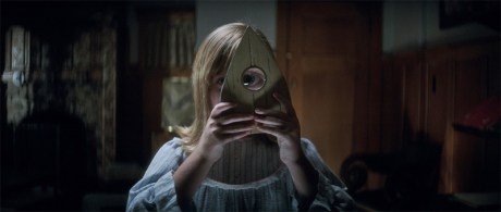 Doris looking through Quija planchette
